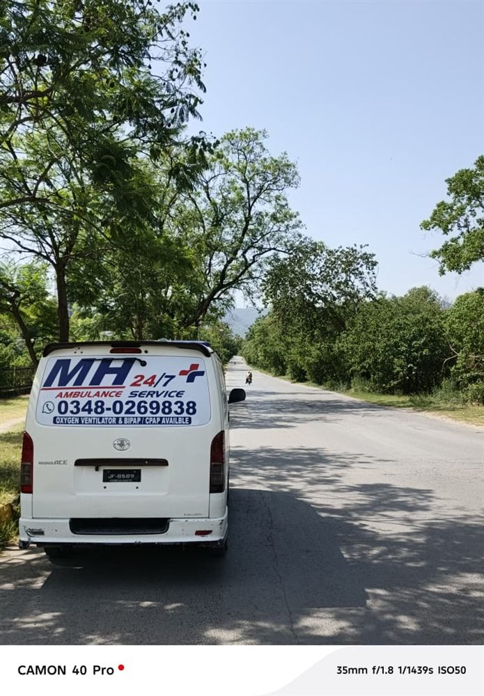 MH 24/7 ambulance en route on a Karachi road